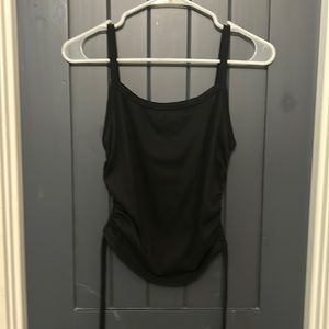 two black tanks with rouching on sides- small and medium